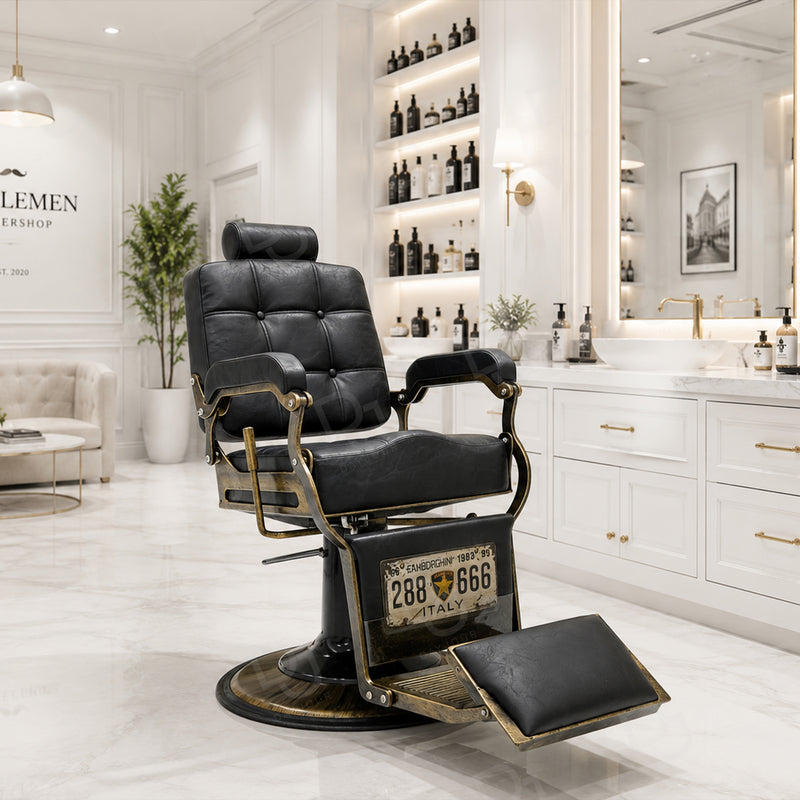 black vintage-style barber chair with quilted padded backrest, adjustable headrest, gold-tone details and footrest