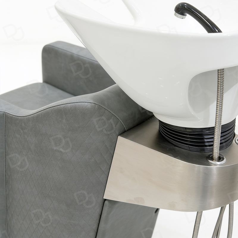 Professional grey salon hair washing chair with integrated white ceramic shampoo basin