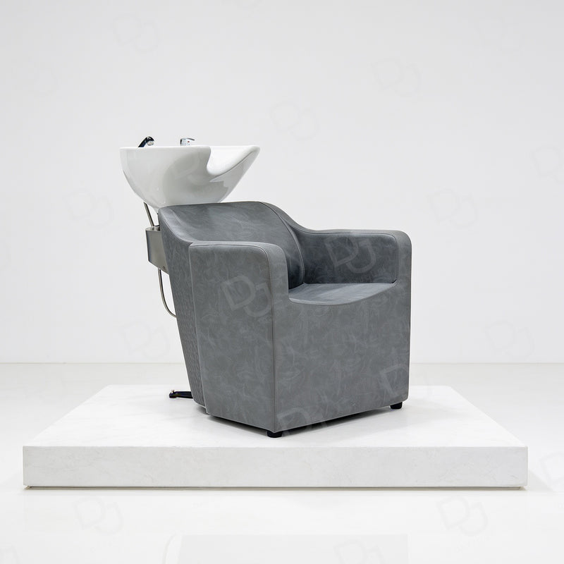 Professional grey salon hair washing chair with integrated white ceramic shampoo basin