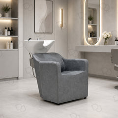 Professional grey salon hair washing chair with integrated white ceramic shampoo basin