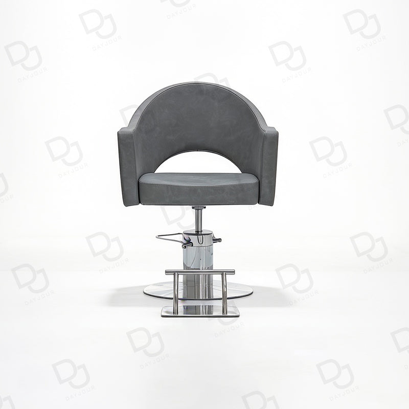 grey ladies styling chair with curved padded backrest, hydraulic chrome base and salon footrest
