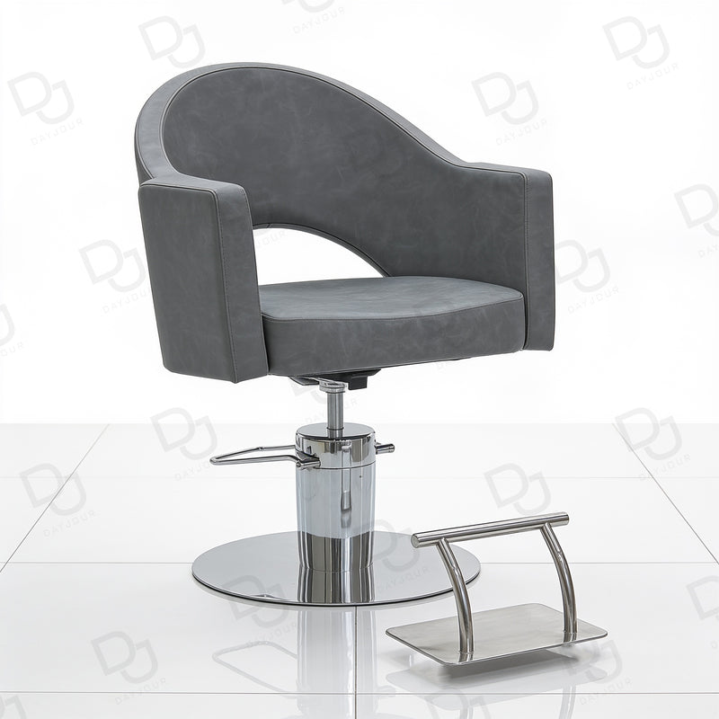 grey ladies styling chair with curved padded backrest, hydraulic chrome base and salon footrest
