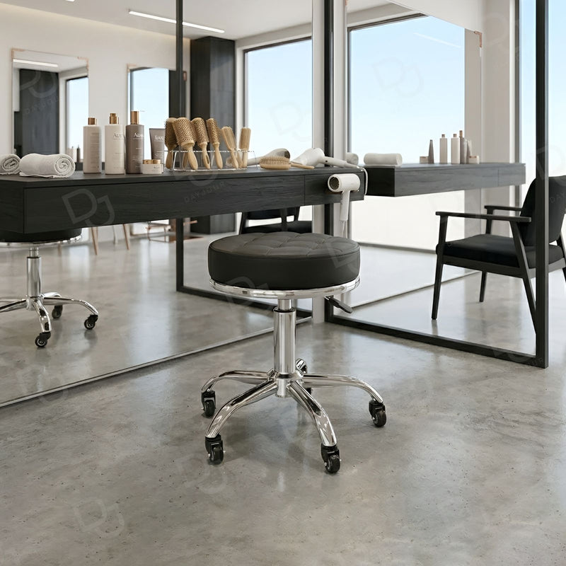 Hydraulic salon stool with black padded seat and chrome base on wheels - salon stool - nail salon technician stool - Dayjour - UAE