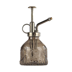 Vintage embossed glass spray bottle with metallic-finish top and fine-mist pump – Dayjour - embossed glass spray bottle UAE - vintage salon sprayer - metallic top mist bottle - Dayjour salon accessories - retro water spray bottle - thick glass fine-mist sprayer - hairstyling spray bottle UAE - beauty spa tools Dubai - professional barber mist bottle